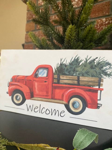 Festive Christmas Welcome Sign with Red Truck and Tree